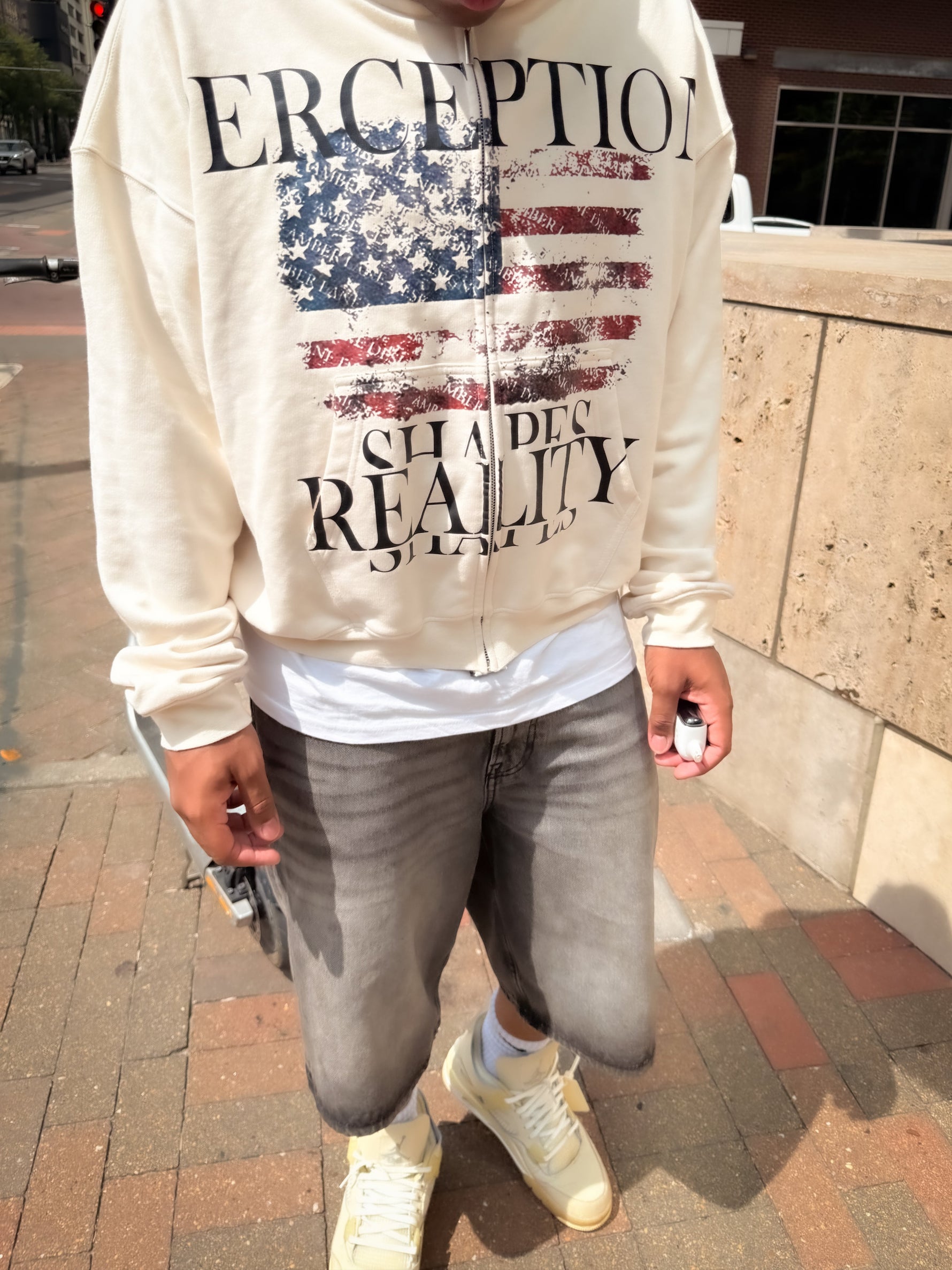 Perception shapes reality zip up